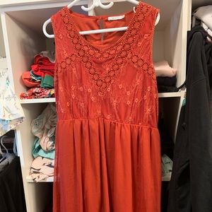 Red dress. High lace neck